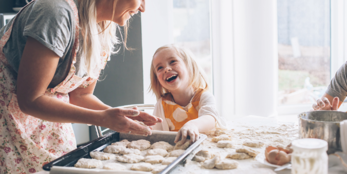 Happy family baking in kitchen