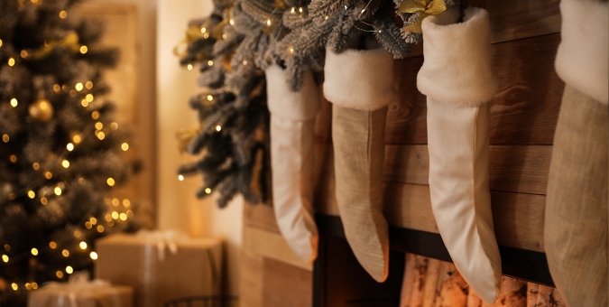 Christmas stocking hanging by a fireplace