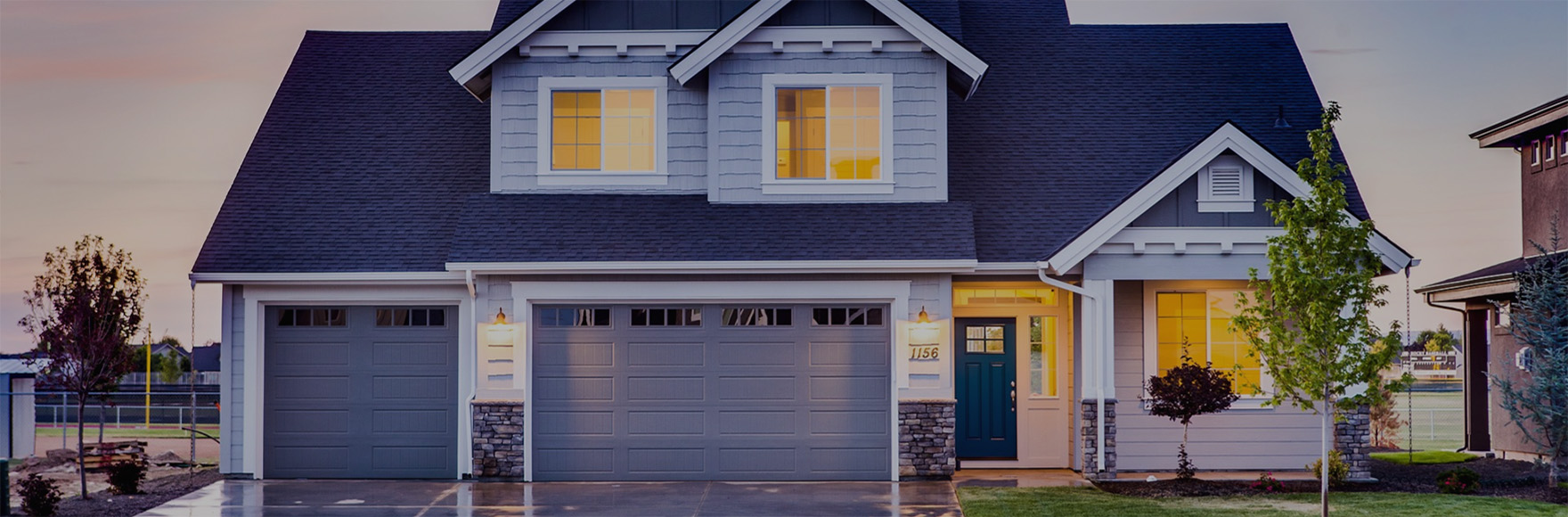 a blue two story house