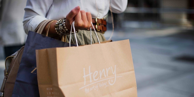 a woman holding a shopping bag