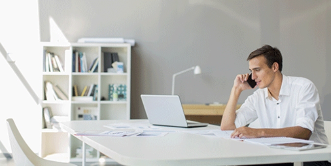 man working from his home office